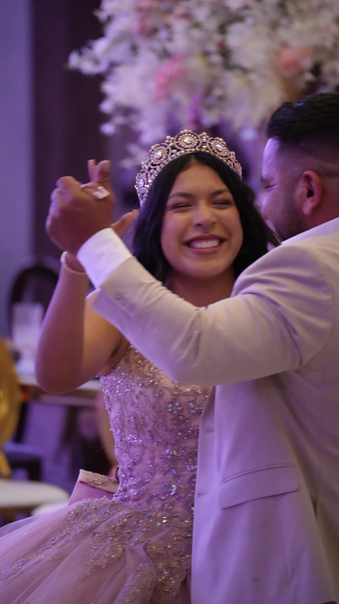a bride and groom dancing at their wedding reception