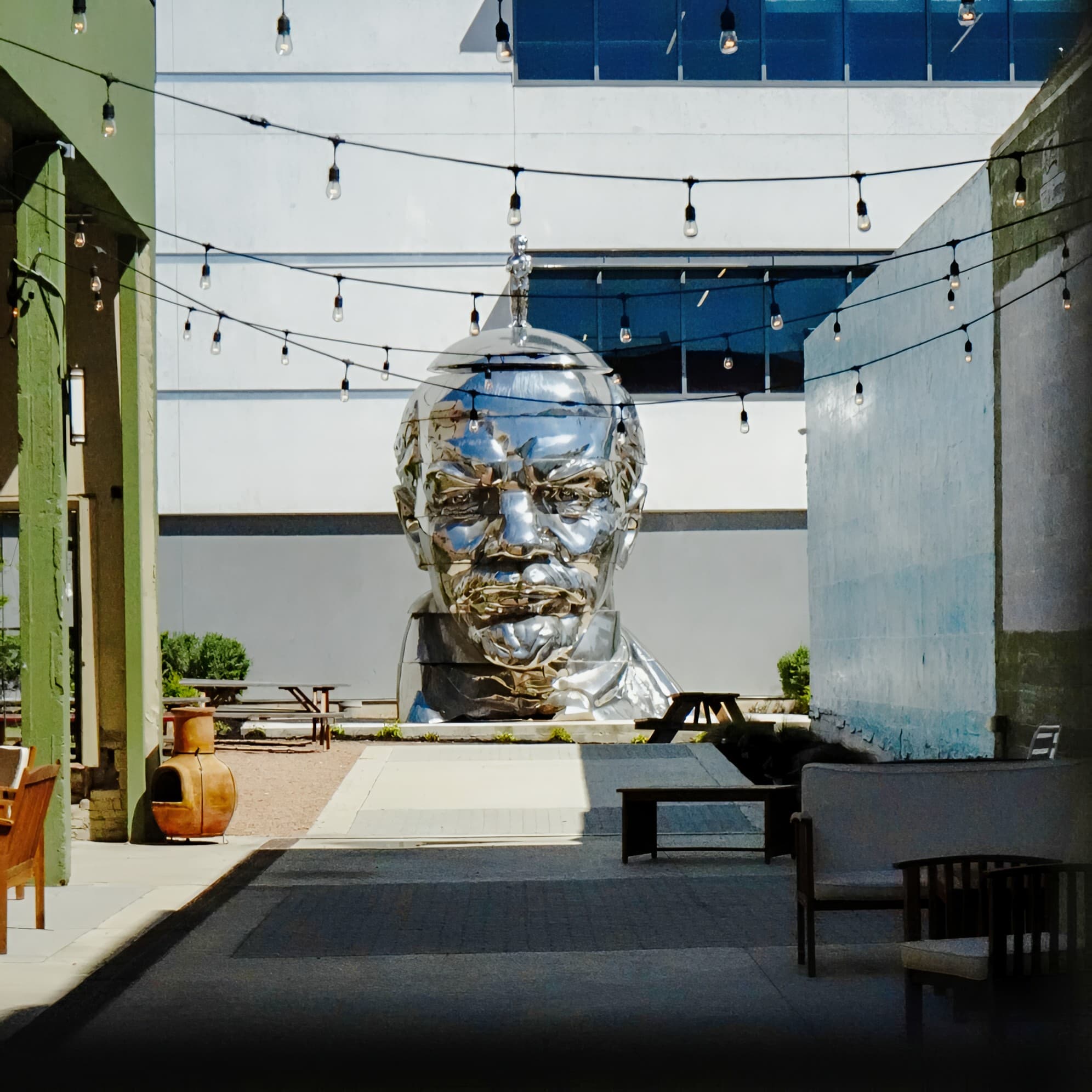 a large sculpture of a man with a face