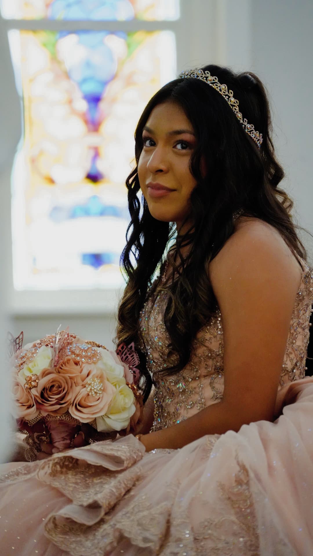 a woman in a wedding dress holding a bouquet